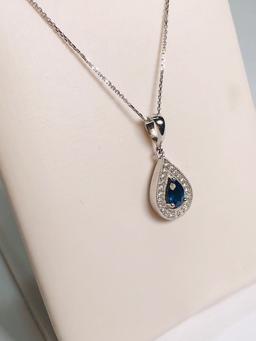 18KT WHITE GOLD 0.50CT SAPHIRE AND 0.15CTW DIAMOND PENDANT WITH CHAIN
