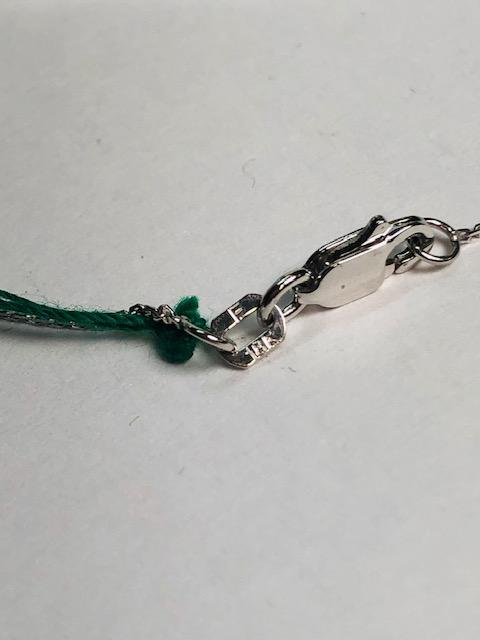 18KT WHITE GOLD 0.50CT SAPHIRE AND 0.15CTW DIAMOND PENDANT WITH CHAIN