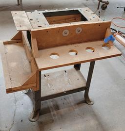 LOT OF WOOD CLAMPS IN CART AND WORK BENCH