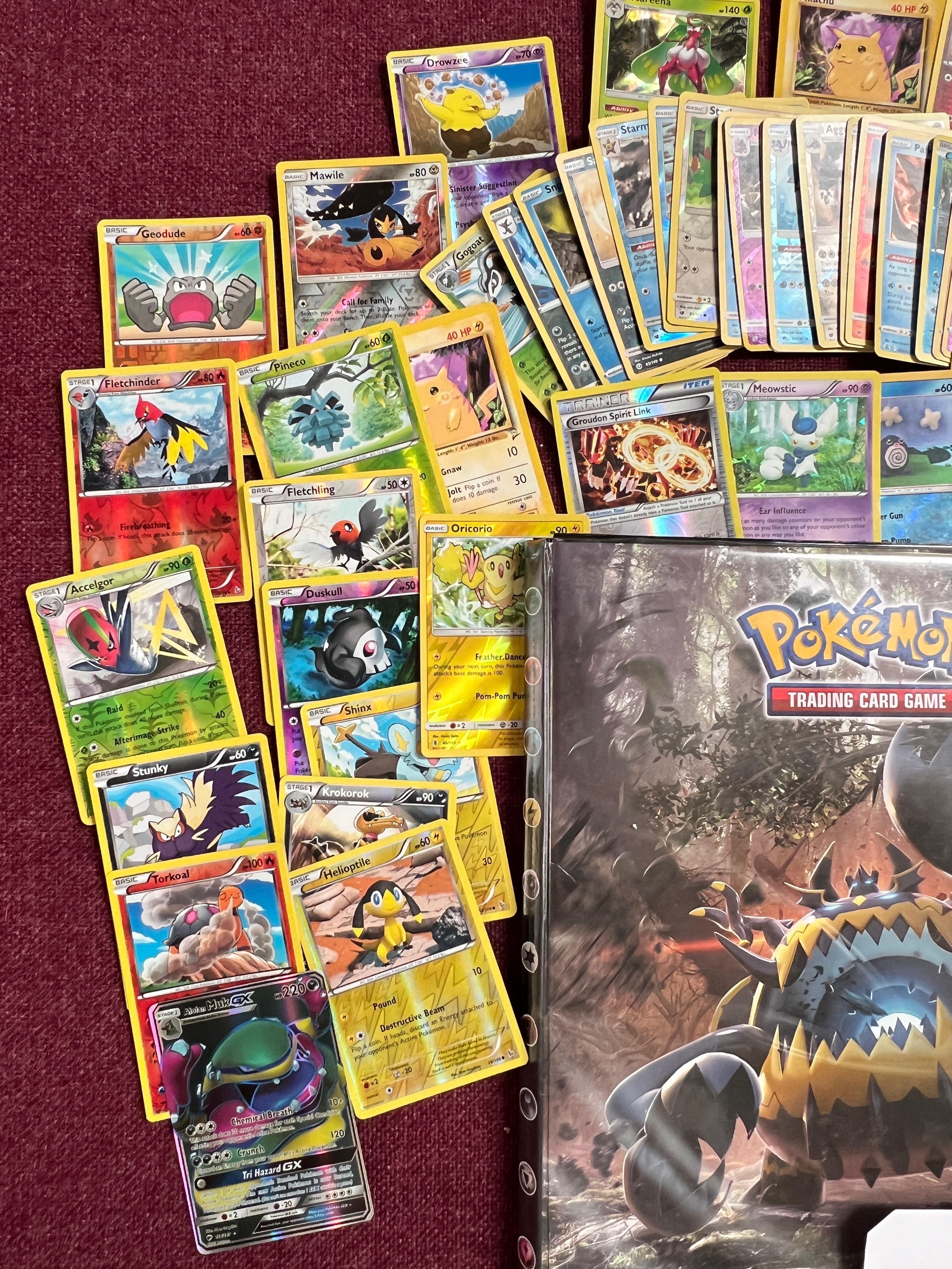 LARGE LOT OF POKEMON CARDS - 2 BINDERS