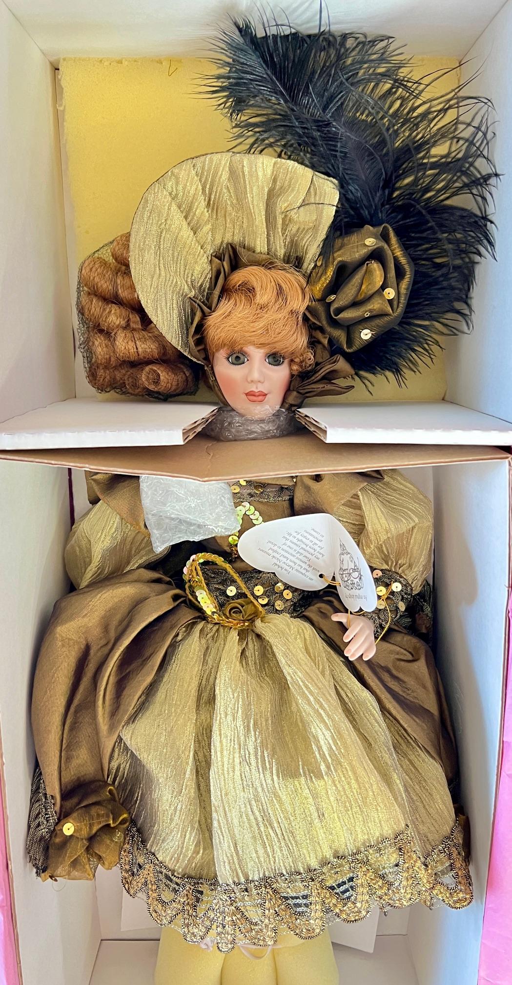 2PC FRANKLIN MONT HEIRLOOM DOLLS IN BOXES - GOLD AND BLACK