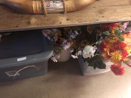 Assortment of faux flowers and decorations