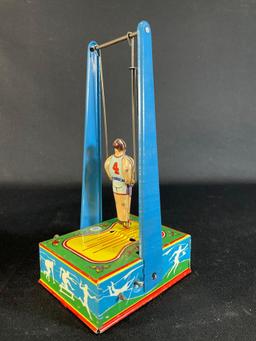 Wyandotte No. 516 Mechanical Man On The "Flying Trapeze" Tin Litho Wind Up Toy w/ Original Box