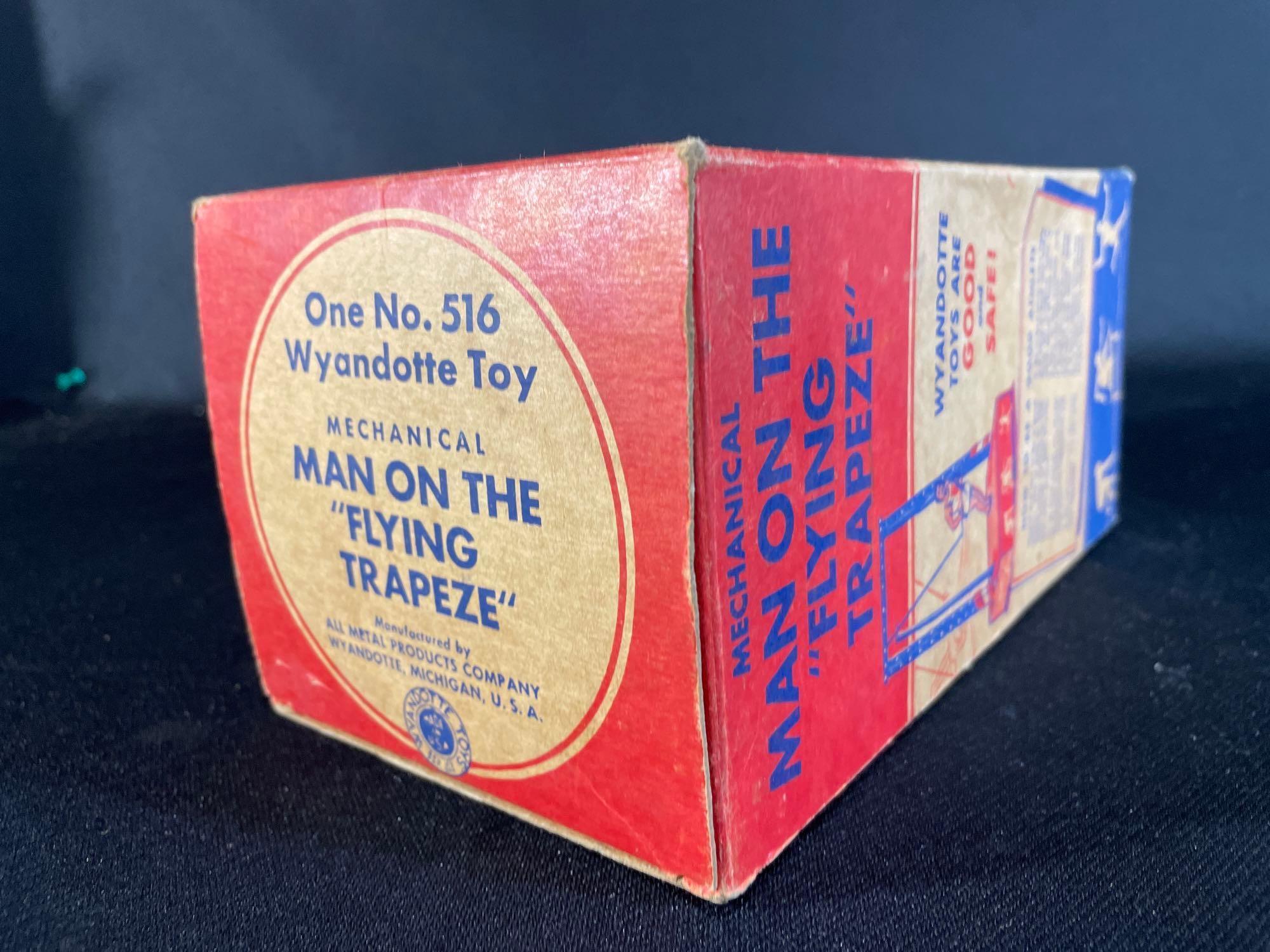 Wyandotte No. 516 Mechanical Man On The "Flying Trapeze" Tin Litho Wind Up Toy w/ Original Box