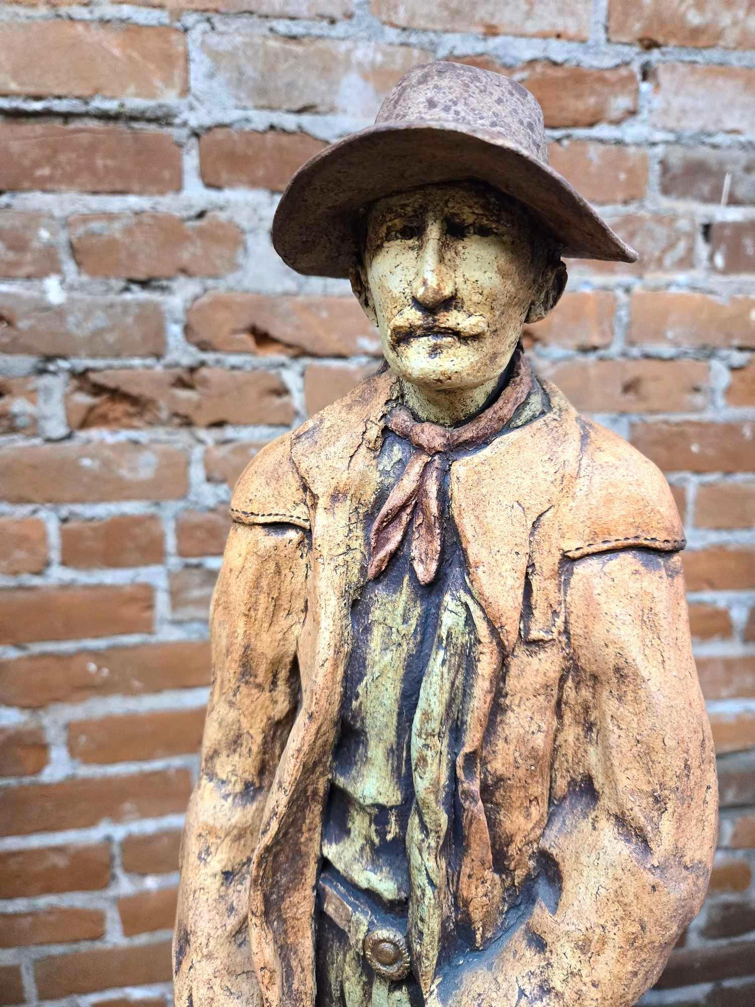 ...Original clay sculpture by Norman Frater, "The Drover"