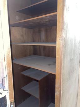 Single Door Cabinet w/ Green Circle On Front