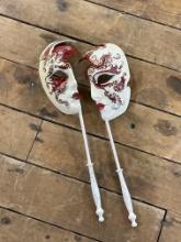 pair of Venetian masks Signed