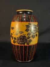 vintage black lacquered vase with a hand-painted floral design