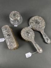 Victorian sterling dresser set heavily embossed with cherubs