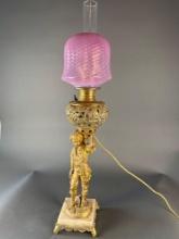 Standing Cherub Cranberry table lamp