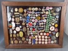 Framed collection of over 100 old badges, political buttons etc
