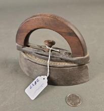 Cast sad iron with wooden handle