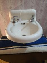 Early small cast iron sink