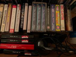 Assorted VHS And Cassette Tapes.