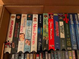 Assorted VHS And Cassette Tapes.
