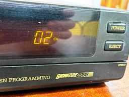 VCR and Box of Tapes