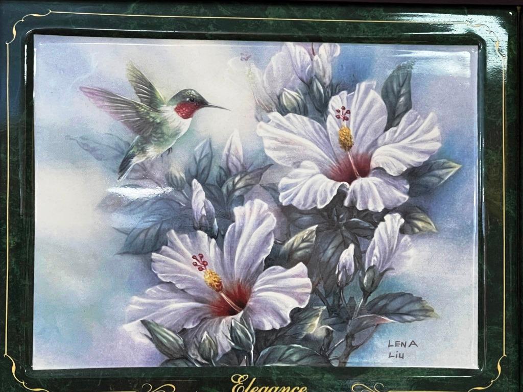 Hummingbird plates in a frame