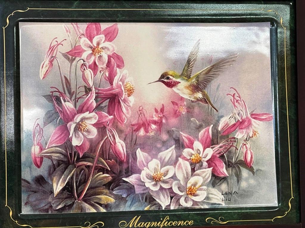 Hummingbird plates in a frame