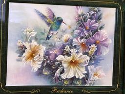 Hummingbird plates in a frame