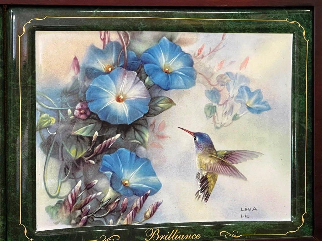Hummingbird plates in a frame