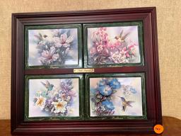 Hummingbird plates in a frame