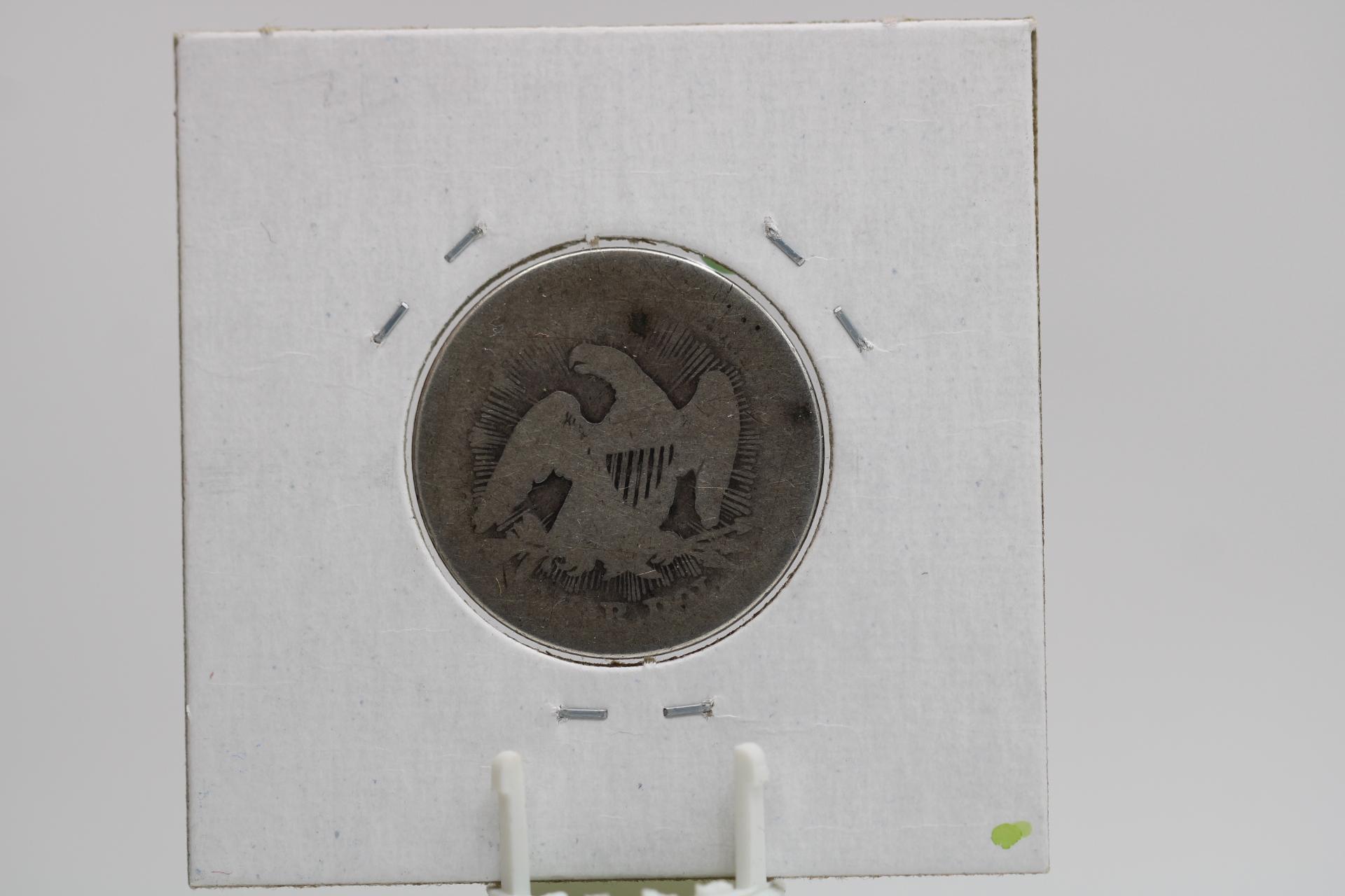 SEATED QUARTER