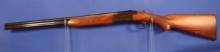 Savage model 330, Over and Under Shotgun. SN#32213V. In Good Condition.