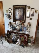Sofa Table, Dolls, Picture, Fenton Style Lamp, 2 Iron Plant Stands & Misc. As Shown