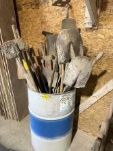 Barrel of Assorted Long Handle Shovels, etc.