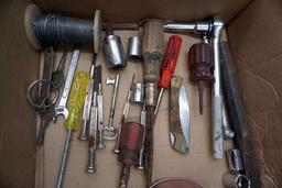 Box of tools, wire, iron, funnel, sockets, ratchet, keys. And more. Pocket knife.