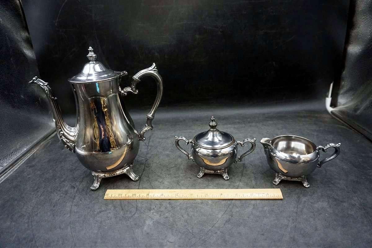 Silver service pieces.