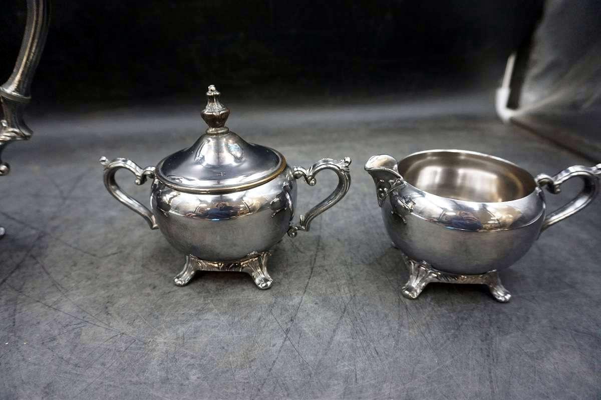 Silver service pieces.