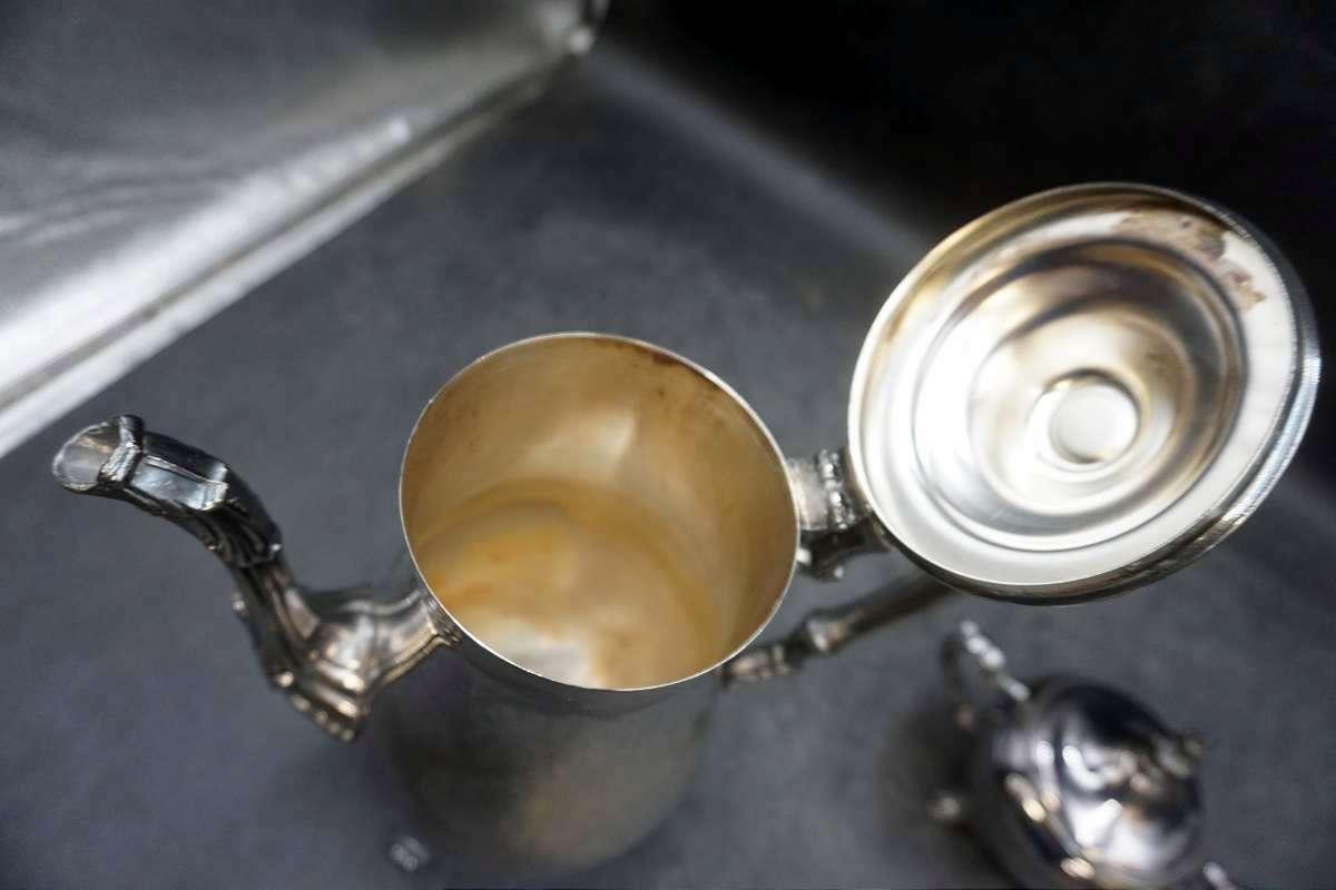 Silver service pieces.