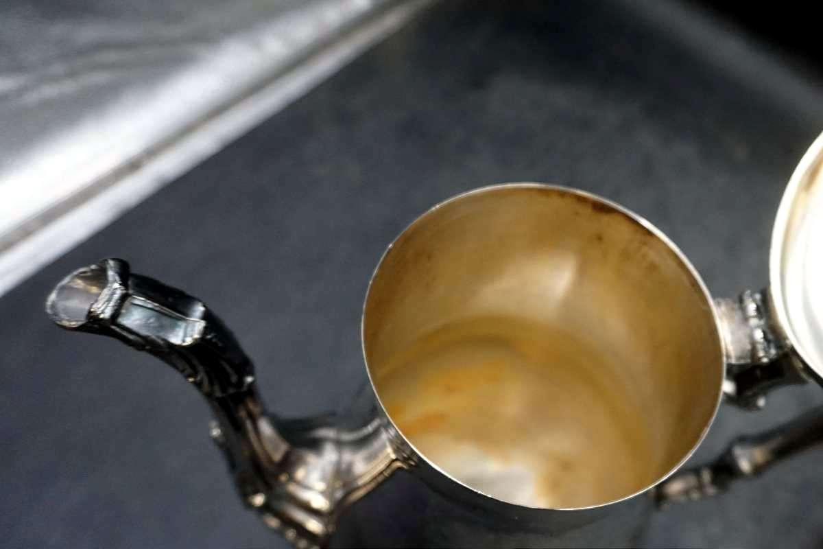 Silver service pieces.