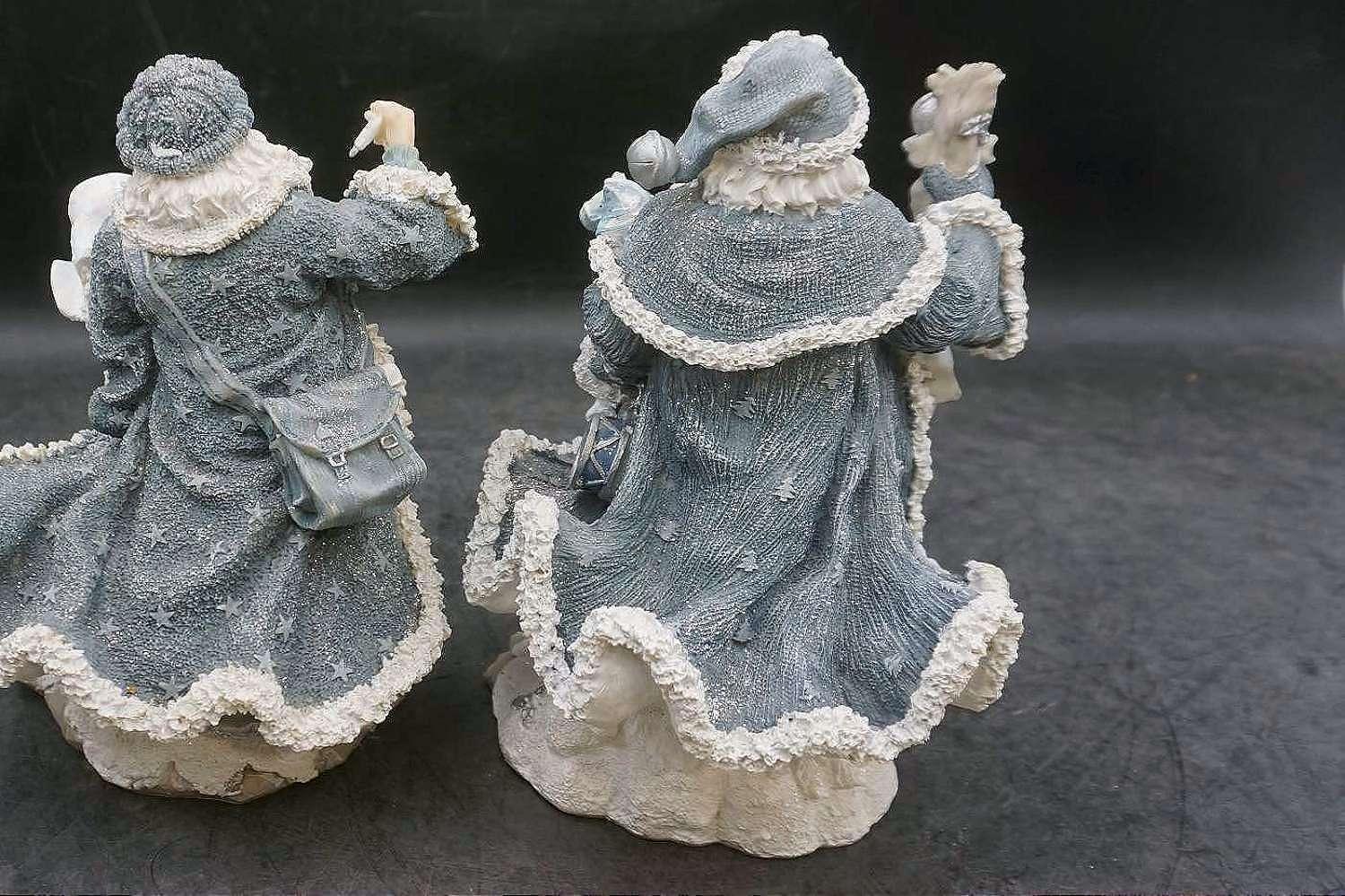 2 Santa Claus Figurines
