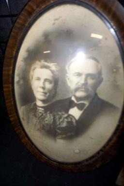 Oval Framed Man & Woman Photo