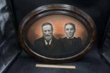 Oval Framed Man & Woman Picture