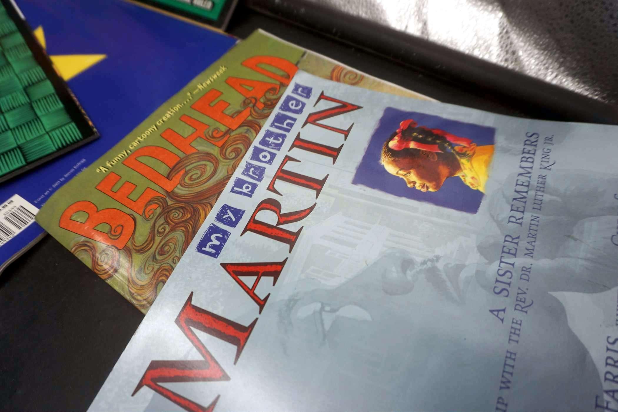 Plastic Bin W/ Assorted Books & Notebook