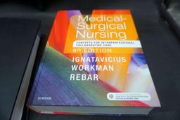 Binder W/ Nursing Literature & Medical-Surgical Nursing Book