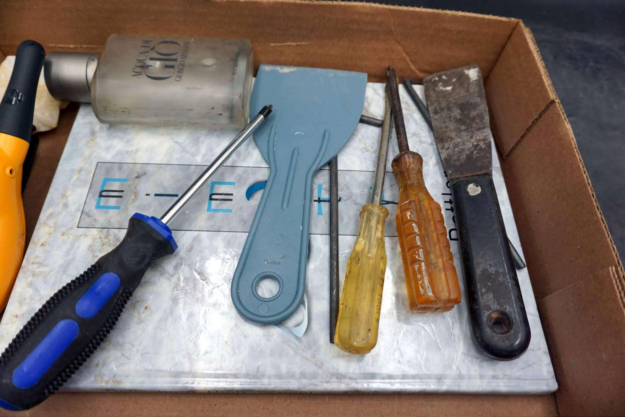 Walkie Talkie, Cologne Bottle, Scrapers, Book & Screwdrivers