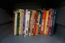 Assorted Cookbooks In Grey Plastic Tote