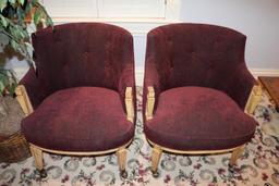 Upholstered armchairs on rollers