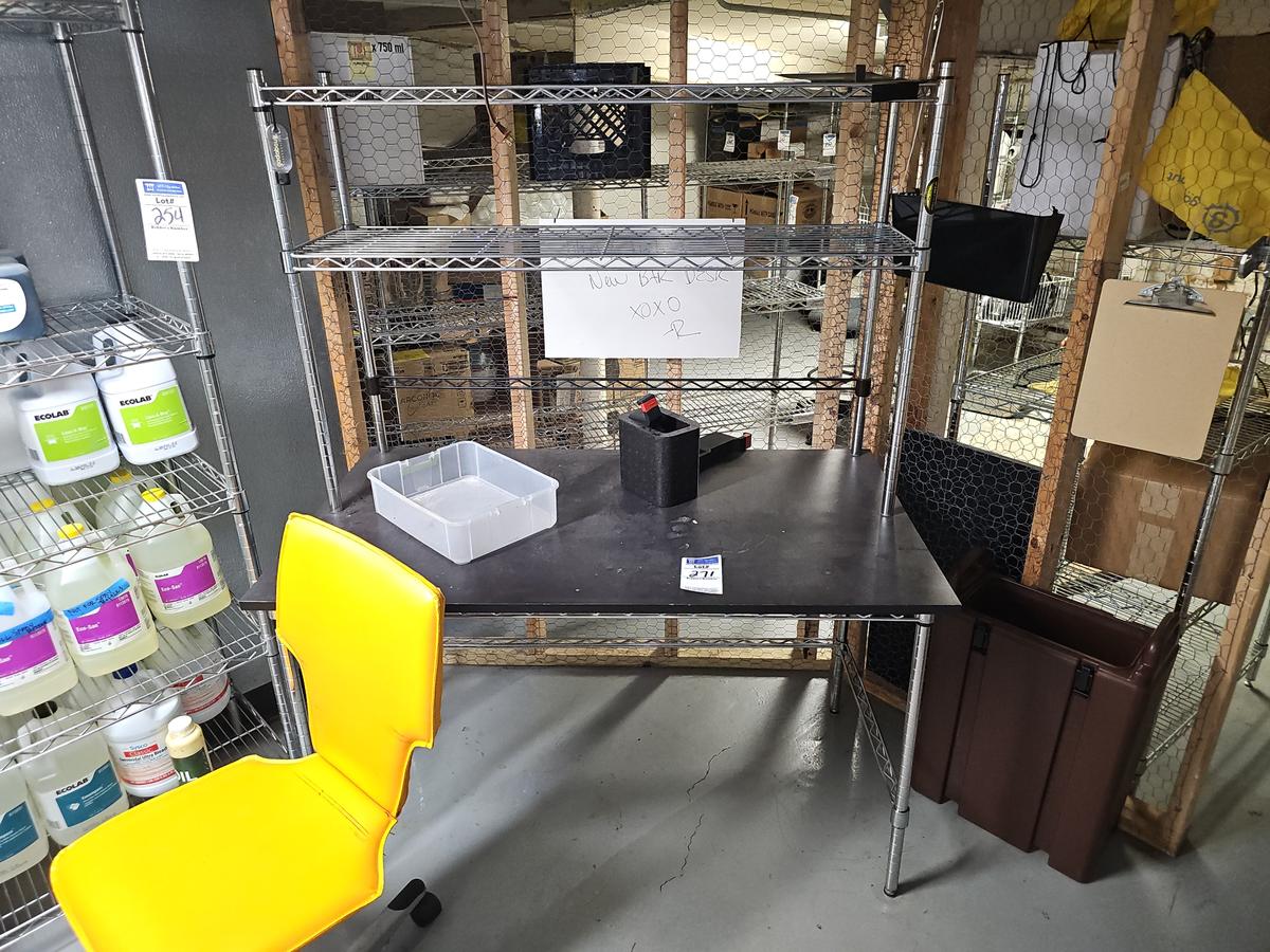 Wire rack desk with orange chair