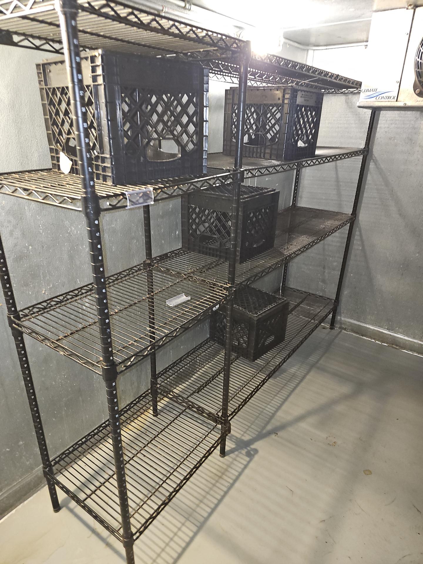 Black coated wire racks in cooler