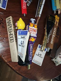 Assorted beer tap heads