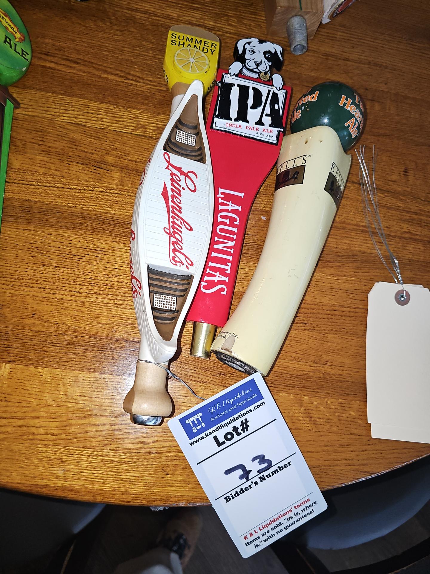 Assorted beer tap heads