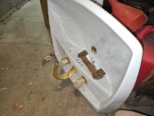 Pedestal sink with faucet