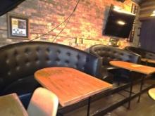 Black vinyl upscale booth with tables
