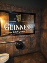 Glass Guinness art work in second floor bathroom