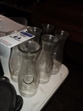 Glass carafes (6 on the table 6 in the bar)